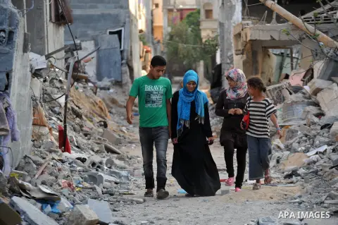 Palestinians return to their houses in Beit Hanoun after a ceasefire was declared, in northern Gaza strip on August 28, 2014. Israel and Palestinians both boasted of victory in the Gaza war but analysts say Hamas receive...