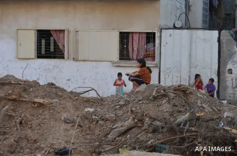 Palestinians return to their houses in Beit Hanoun after a ceasefire was declared, in northern Gaza strip on August 28, 2014. Israel and Palestinians both boasted of victory in the Gaza war but analysts say Hamas receive...