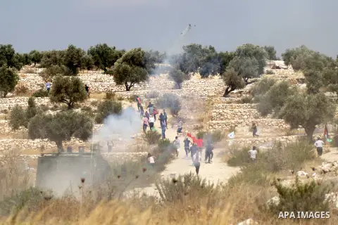 Palestinian protestors clash with Israeli security forces in the village of Bilin, near the West Bank city of Ramallah following a march in support of the resistance in the Gaza Strip on August 29, 2014. Seven weeks of w...