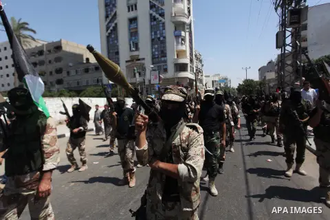 Palestinian Islamic Jihad militants take part in a rally celebrating what they say was a victory over Israel following a ceasefire in Gaza City August 29, 2014. An open-ended ceasefire, mediated by Egypt, took effect on...