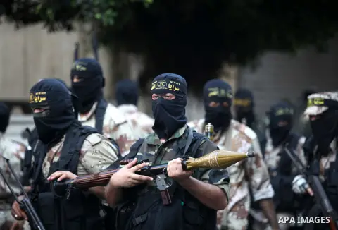 Palestinian Islamic Jihad militants take part in a rally celebrating what they say was a victory over Israel following a ceasefire in Gaza City August 29, 2014. An open-ended ceasefire, mediated by Egypt, took effect on...