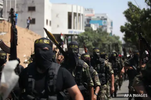 Palestinian Islamic Jihad supporters celebrate with people what they said was a victory over Israel, in Gaza City August 29, 2014. An open-ended ceasefire, mediated by Egypt, took effect on Tuesday evening. It called for...