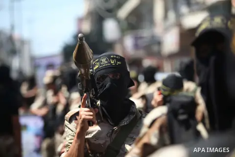 Palestinian Islamic Jihad supporters celebrate with people what they said was a victory over Israel, in Gaza City August 29, 2014. An open-ended ceasefire, mediated by Egypt, took effect on Tuesday evening. It called for...