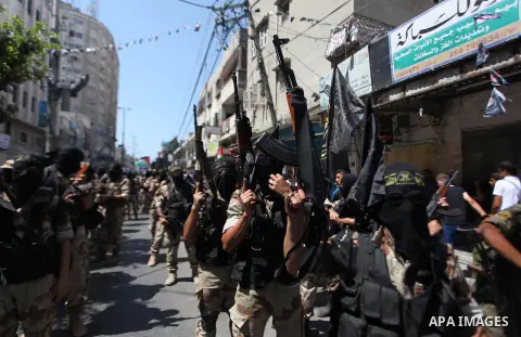 Palestinian Islamic Jihad supporters celebrate with people what they said was a victory over Israel, in Gaza City August 29, 2014. An open-ended ceasefire, mediated by Egypt, took effect on Tuesday evening. It called for...
