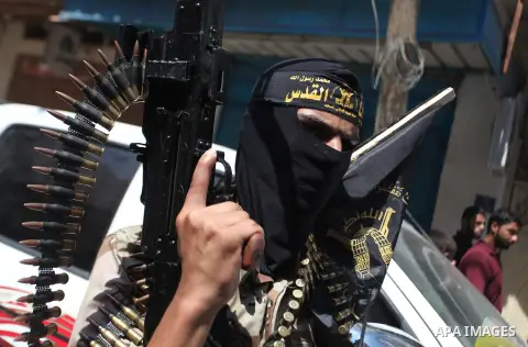 Palestinian Islamic Jihad supporters celebrate with people what they said was a victory over Israel, in Gaza City August 29, 2014. An open-ended ceasefire, mediated by Egypt, took effect on Tuesday evening. It called for...