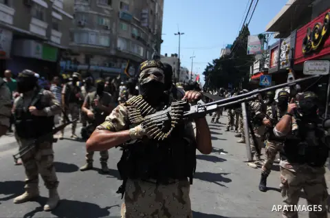 Palestinian Islamic Jihad supporters celebrate with people what they said was a victory over Israel, in Gaza City August 29, 2014. An open-ended ceasefire, mediated by Egypt, took effect on Tuesday evening. It called for...