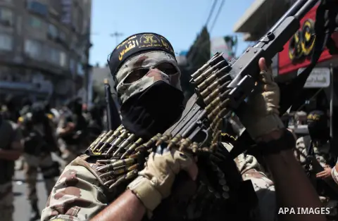 Palestinian Islamic Jihad supporters celebrate with people what they said was a victory over Israel, in Gaza City August 29, 2014. An open-ended ceasefire, mediated by Egypt, took effect on Tuesday evening. It called for...