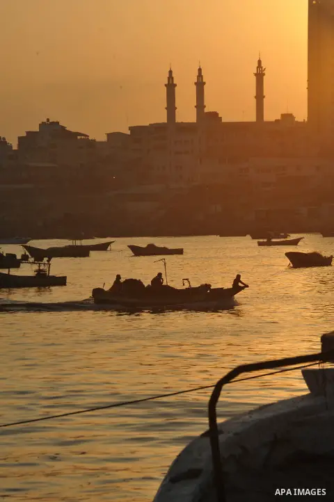 Palestinian fishing boats are moored at Gaza's seaport in Gaza City early on August 29, 2014. Israel and Hamas accepted an Egyptian proposal for a long-term ceasefire in war-torn Gaza on August 26 in a move to end 50 day...