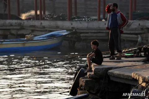 Palestinian fishing boats are moored at Gaza's seaport in Gaza City early on August 29, 2014. Israel and Hamas accepted an Egyptian proposal for a long-term ceasefire in war-torn Gaza on August 26 in a move to end 50 day...