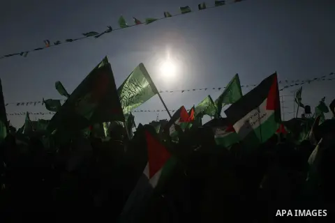 Palestinians who support the Islamic Hamas movement celebrate what they said was a victory by Palestinians in Gaza over Israel following a ceasefire, in the West Bank city of Ramallah August 30, 2014. An open-ended cease...