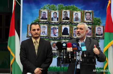 Palestinian top Hamas leader in Gaza, Ismail Haniyeh, speaks during a ceremony honoring to Journalists's families in Gaza city on 30 August 2014. An indefinite ceasefire to end seven weeks of fighting between Israel and...