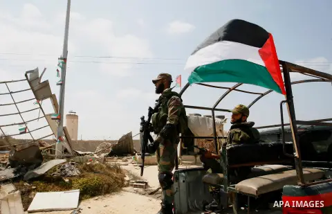 Palestinian security forces inspect security headquarters destroyed during fighting between Hamas militants and Israel on the border between Egypt and Gaza in Rafah, southern Gaza Strip in August 31, 2014. An indefinite...