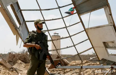 Palestinian security forces inspect security headquarters destroyed during fighting between Hamas militants and Israel on the border between Egypt and Gaza in Rafah, southern Gaza Strip in August 31, 2014. An indefinite...