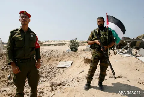 Palestinian security forces inspect security headquarters destroyed during fighting between Hamas militants and Israel on the border between Egypt and Gaza in Rafah, southern Gaza Strip in August 31, 2014. An indefinite...