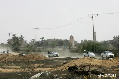 Palestinian security forces inspect security headquarters destroyed during fighting between Hamas militants and Israel on the border between Egypt and Gaza in Rafah, southern Gaza Strip in August 31, 2014. An indefinite...