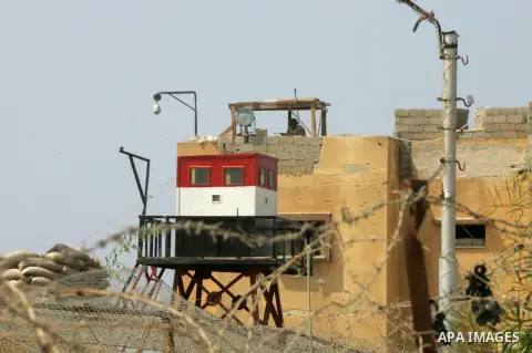Palestinian security forces inspect security headquarters destroyed during fighting between Hamas militants and Israel on the border between Egypt and Gaza in Rafah, southern Gaza Strip in August 31, 2014. An indefinite...