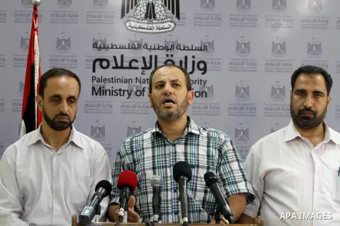 Palestinian assistant undersecretary of the Ministry of Economy, Imad El-Baz, speaks during a press conference, on Sep. 03, 2014. Photo by Mohammed Asad