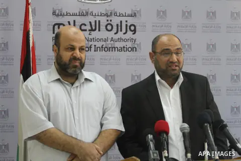 Palestinian Undersecretary of Minister of Awqaf and Religious Affairs, Hassan El-Safi, speaks during a Press conference, in Gaza city, on Sep. 03, 2014. Photo by Mohammed Asad