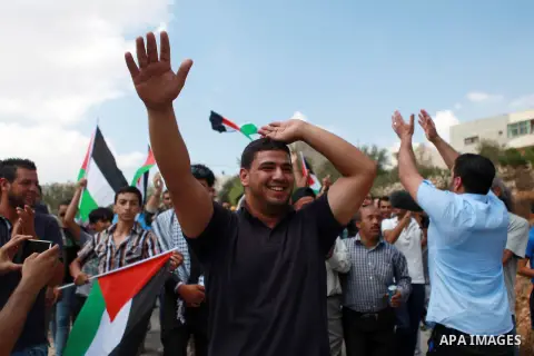 Palestinians take part in a representation wedding ceremony to refused what they say is land confiscation for Jewish settlements village of Qaryout, near the West Bank City of Nablus on Sep. 05, 2014. Photo by Shadi Hate...