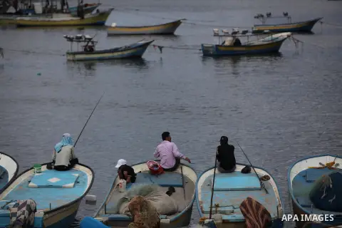 Palestinian fishermen cast their nets at Gaza's seaport in Gaza City on Sep. 06 2014. Israel and Hamas accepted an Egyptian proposal for a long-term ceasefire in war-torn Gaza. Restrictions imposed on Gaza fishermen are...