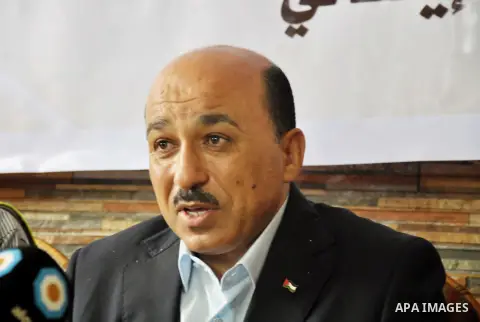 Palestinian Minister of public works and housing, Mufid al-Hasayna speaks during a press conference in Gaza City. September 6, 2014. Photo by Mohammed Talatene