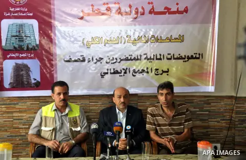 Palestinian Minister of public works and housing, Mufid al-Hasayna speaks during a press conference in Gaza City. September 6, 2014. Photo by Mohammed Talatene