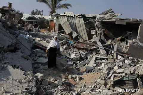 A Palestinian Bedouin stands on the rubble of her house which destroyed during fighting between Hamas militants and Israel in the center of Gaza strip on September 08, 2014. Calm returned to the coastal enclave in a Augu...