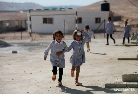 Palestinian Bedouin Students arrive to Arab Al-Ka'abneh school in Al-Mu'arrajat area near the West Bank city of Jericho, on Sep. 08, 2014. Dozens of Palestinian children in the ramshackle Bedouin community outside Jerusa...