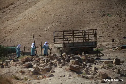 Palestinian Bedouin Students arrive to Arab Al-Ka'abneh school in Al-Mu'arrajat area near the West Bank city of Jericho, on Sep. 08, 2014. Dozens of Palestinian children in the ramshackle Bedouin community outside Jerusa...
