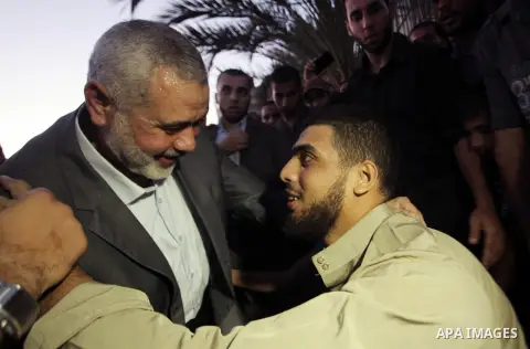 Senior leader of Hamas Ismail Haniyeh gets welcome during his inspection visit to the Deir al-Balah in the central Gaza Strip, on September 10, 2014. Hamas's exiled deputy leader said Wednesday that indirect talks with I...
