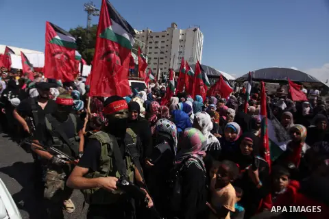 Palestinian militants from the Democratic Front for the Liberation of Palestine (DFLP) take part in a military show in Gaza City September 11, 2014. An open-ended ceasefire between Israel and Hamas-led Gaza militants, me...