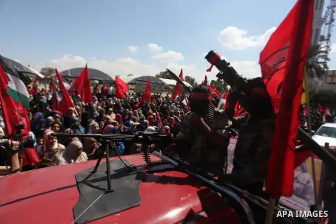 Palestinian militants from the Democratic Front for the Liberation of Palestine (DFLP) take part in a military show in Gaza City September 11, 2014. An open-ended ceasefire between Israel and Hamas-led Gaza militants, me...