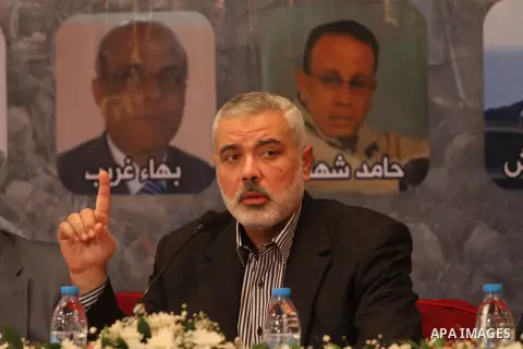 Senior leader of Hamas Ismail Haniyeh speaks during a meeting with members of media in Gaza city on Sept. 13, 2014. Photo by Mohammed Asad