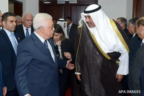 Palestinian President Mahmoud Abbas (L) meets Kuwait's Minister of Foreign Affairs Sheikh Sabah al Khalid al Sabah, in the West Bank city of Ramallah September 14, 2014. Photo by Thaer Ganaim