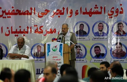 Palestinians attend a ceremony to honor the relatives of the media members who were killed in the Israeli offensive on Sep. 22, 2014. An open-ended ceasefire between Israel and Hamas-led Gaza militants, mediated by Egypt...