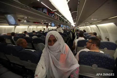 Palestinian Muslim pilgrims in their way for the annual hajj pilgrimage to the holy city of Mecca, in Cairo, Egypt on Sept. 23, 2014. Hundreds of Palestinian pilgrims are leaving Gaza strip through the Rafah crossing on...