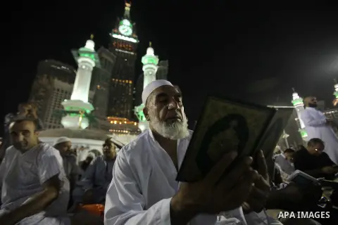 Muslim pilgrims walk outside the Grand Mosque during the annual Hajj in Mecca, Saudi Arabia, Sept. 23, 2014. About 160 countries converge annually on the Islamic cities of Mecca and Medina in western Saudi Arabia for the...