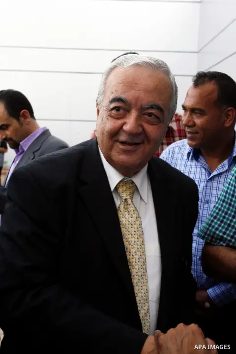 Palestinian Minister of Labour, Mamoun Abu Shahla walks at Rafah crossing as he waits to recieve the Ecuadorian Deputy Foreign Minister, in Rafah between Gaza Strip and Egypt, in the southern Gaza Strip, Sep. 24, 2014. T...
