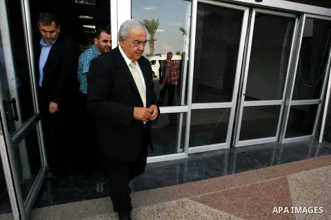 Palestinian Minister of Labour, Mamoun Abu Shahla walks at Rafah crossing as he waits to recieve the Ecuadorian Deputy Foreign Minister, in Rafah between Gaza Strip and Egypt, in the southern Gaza Strip, Sep. 24, 2014. T...