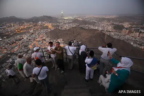 Muslim pilgrims pray at Mount Al-Noor during the annual haj pilgrimage in Mecca, on September 29, 2014, Mount Al-Noor houses Ghar-E-Hira or Hira cave, where Prophet Mohammad is said to have spent a great deal of time in...