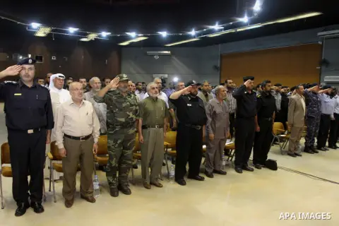 Palestinian policemen attend a ceremony to honor their relatives who were killed by Israel during the summer's fierce offensive, in Gaza city on Sep. 30, 2014. An open-ended ceasefire between Israel and Hamas-led Gaza mi...