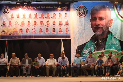 Palestinian policemen attend a ceremony to honor their relatives who were killed by Israel during the summer's fierce offensive, in Gaza city on Sep. 30, 2014. An open-ended ceasefire between Israel and Hamas-led Gaza mi...