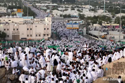 Muslim pilgrims gather on Mount Arafat, near Mecca, as they take part in one of the Hajj rituals on October 3, 2014. The pilgrims perform a series of rituals during the annual Hajj. They circumambulate the kaaba seven ti...