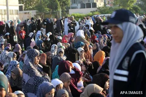 Palestinians attend the prayers of Eid al-Adha or the Feast of Sacrifice, in Gaza city on October 4, 2014. Muslims around the world are celebrating Eid al-Adha, the Festival of Sacrifice, to mark the end of the hajj pilg...