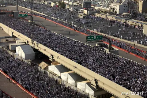 Muslim pilgrims walk to cast stones at a pillar, symbolizing the stoning of Satan, in a ritual called "Jamarat," a rite of the annual hajj, in Mina near the holy city of Mecca on October 04, 2014. The pilgrims perform a...