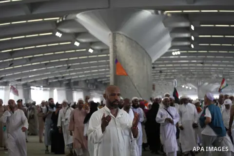 Muslim pilgrims arrive to cast stones at a pillar, symbolizing the stoning of Satan, in a ritual called "Jamarat," a rite of the annual hajj, in Mina near the holy city of Mecca on October 05, 2014. The pilgrims perform...