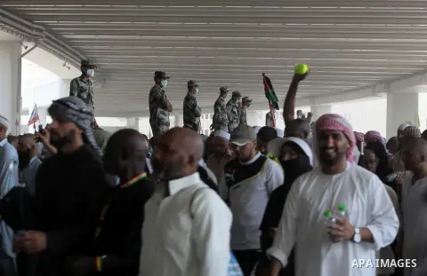 Muslim pilgrims arrive to cast stones at a pillar, symbolizing the stoning of Satan, in a ritual called "Jamarat," a rite of the annual hajj, in Mina near the holy city of Mecca on October 06, 2014. The pilgrims perform...