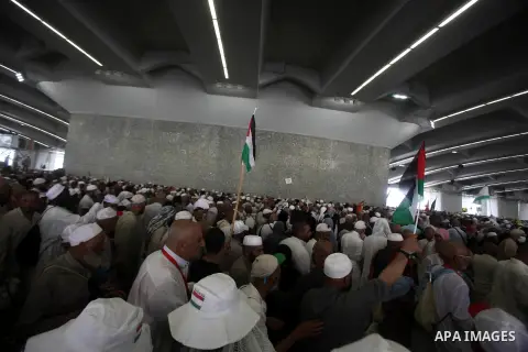 Muslim pilgrims arrive to cast stones at a pillar, symbolizing the stoning of Satan, in a ritual called "Jamarat," a rite of the annual hajj, in Mina near the holy city of Mecca on October 06, 2014. The pilgrims perform...