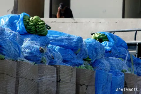 A truck loaded with goods enters the Gaza Strip from Israel through the Kerem Shalom crossing in Rafah in southern Gaza Strip on October 12, 2014. Some 50 countries are attending a Gaza Donor Conference in Egypt, with Pa...