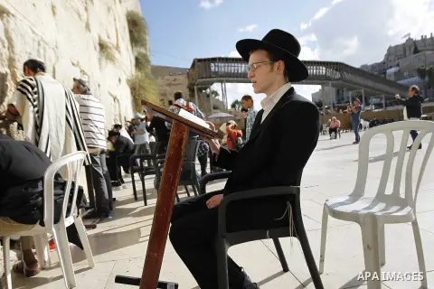Ultra-Jewish Orthodox men pray at the Western Wall, in Jerusalem's Old city on October 20, 2014. Israeli and Palestinian police kept a tight watch over the al-Aqsa mosque compound on Monday amid high tension between Musl...